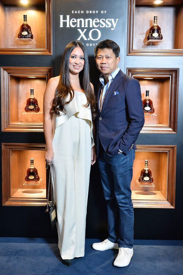 2016, November: Radiant in a white pant suit at the Hennessy X.O Odyssey 2016 event with Datuk Michael