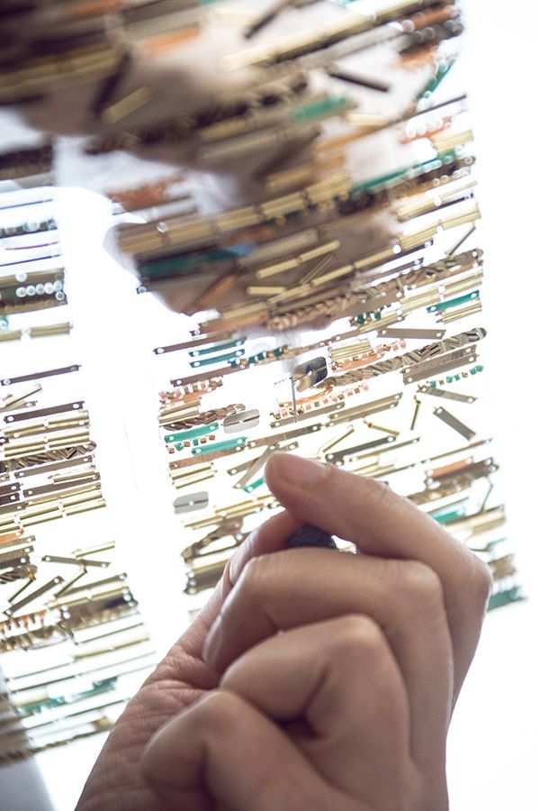 The organza is embroidered with 47,000 multicoloured sequins, in the Lesage ateliers
