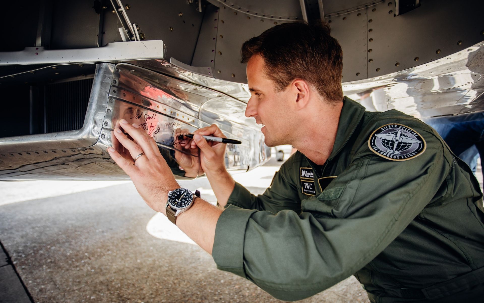 IWC CEO Christoph Grainger-Herr leaving his signature on the Silver Spitfire