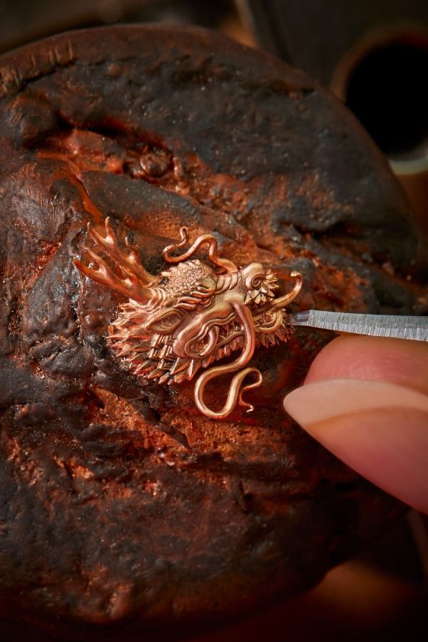 Intricate engraving on gold