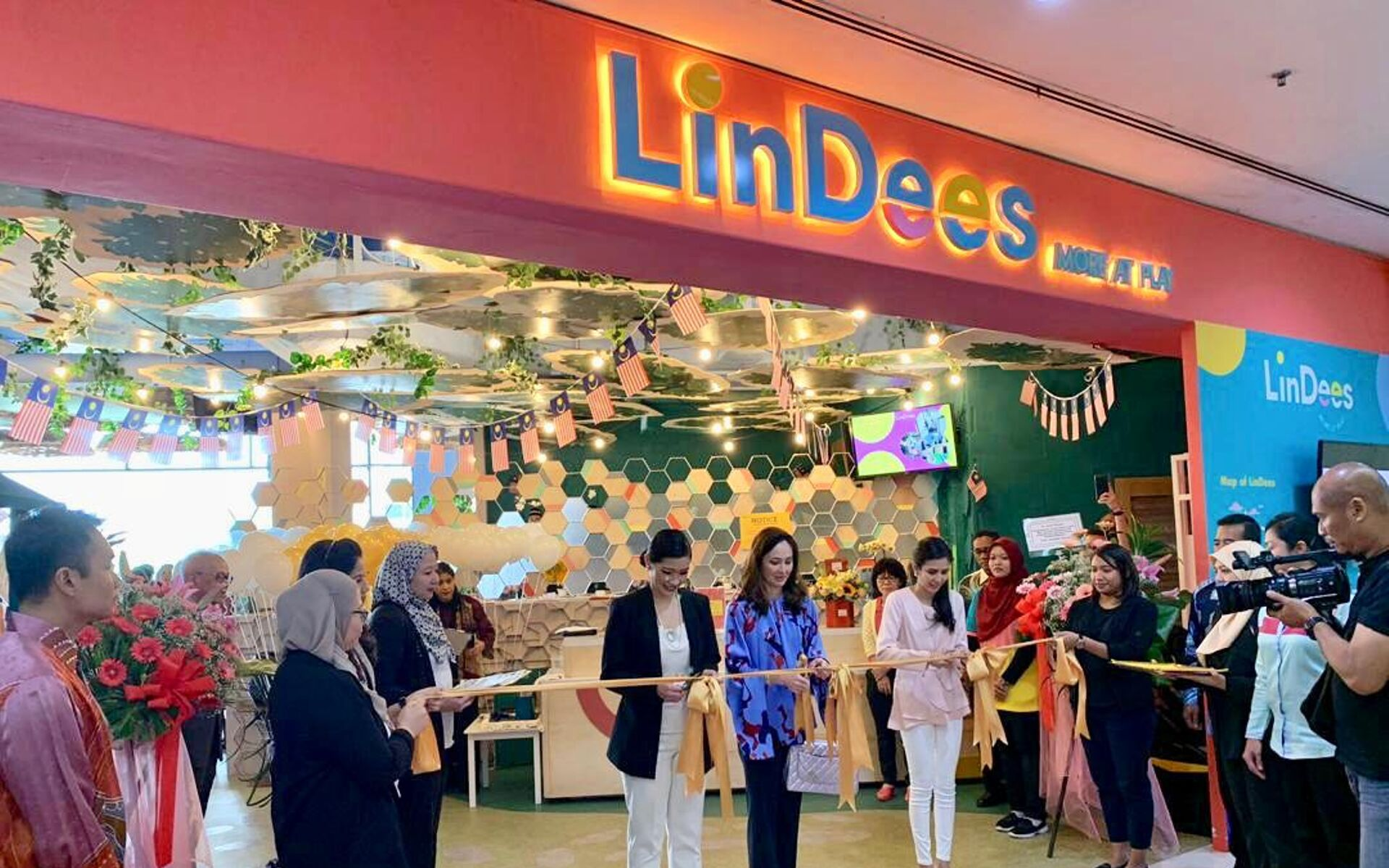 Mien Dee Young, HRH Tuanku Zara Salim, and Nurlin Salleh at the ribbon-cutting ceremony