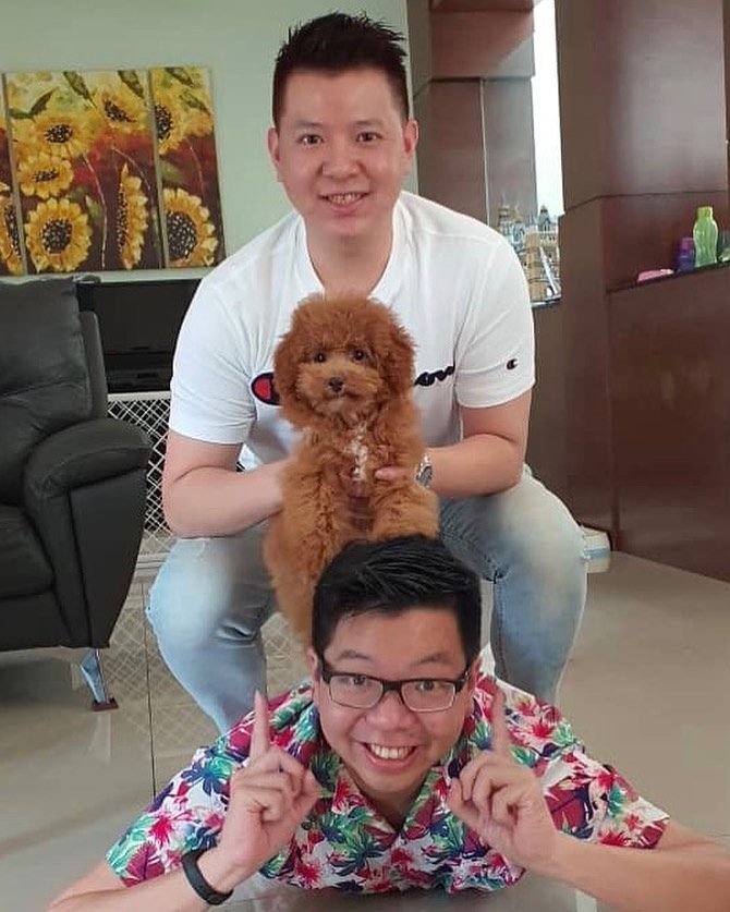 Who says it's all work and no play for Dr. Renard Siew and his brother, pictured here with their furry friend on the first day of Chinese New Year? (Photo: @ren_d3zvous/Instagram)