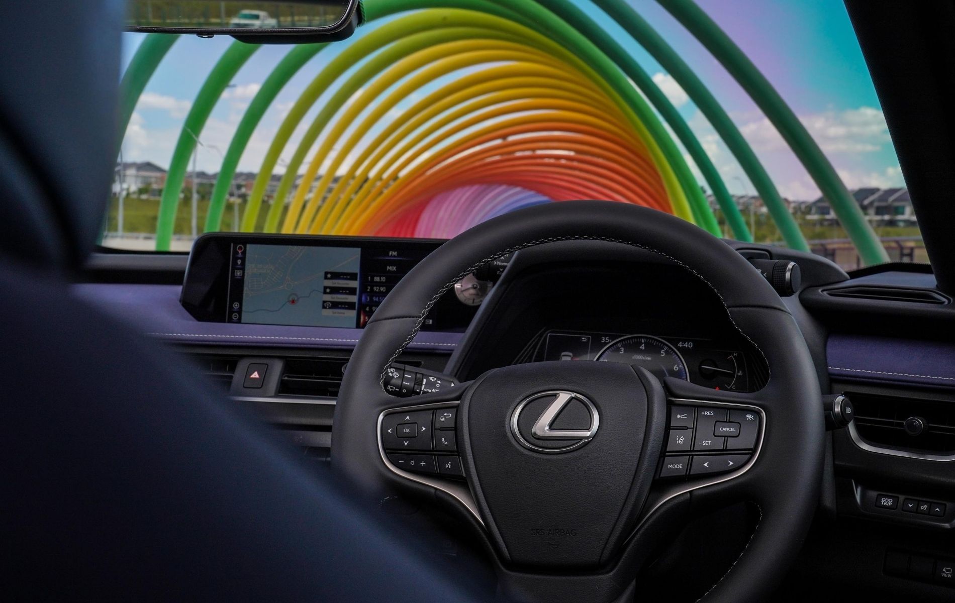 The UX 200 F Sport boasts additional features such as an analogue clock and paddle shifters