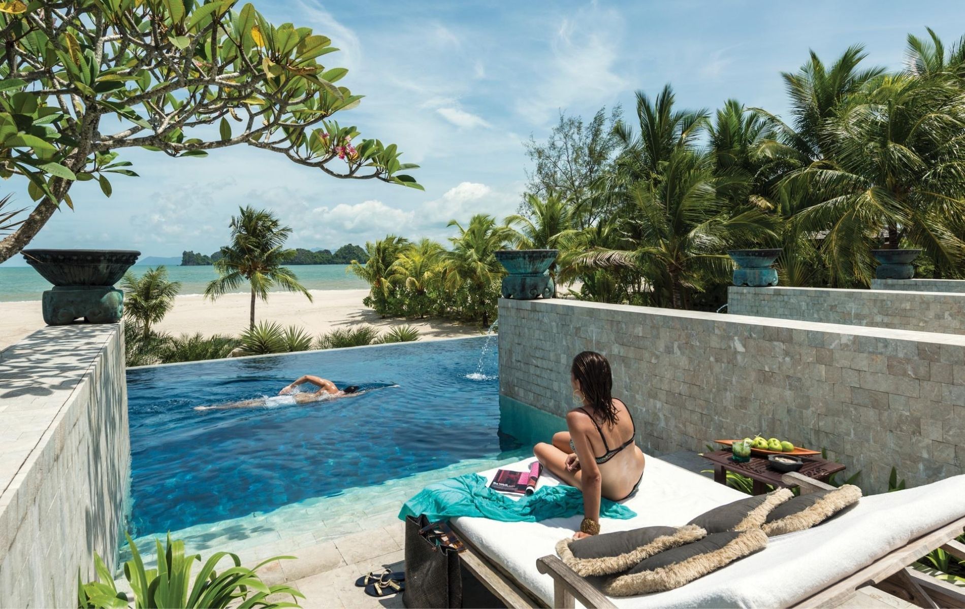 The Quiet Pool at Four Seasons Resort Langkawi admits adults only and is partitioned into a few private cubicles that descend into the common infinity pool overlooking the Andaman Sea (Photo: Seet, Ken / Four Seasons)