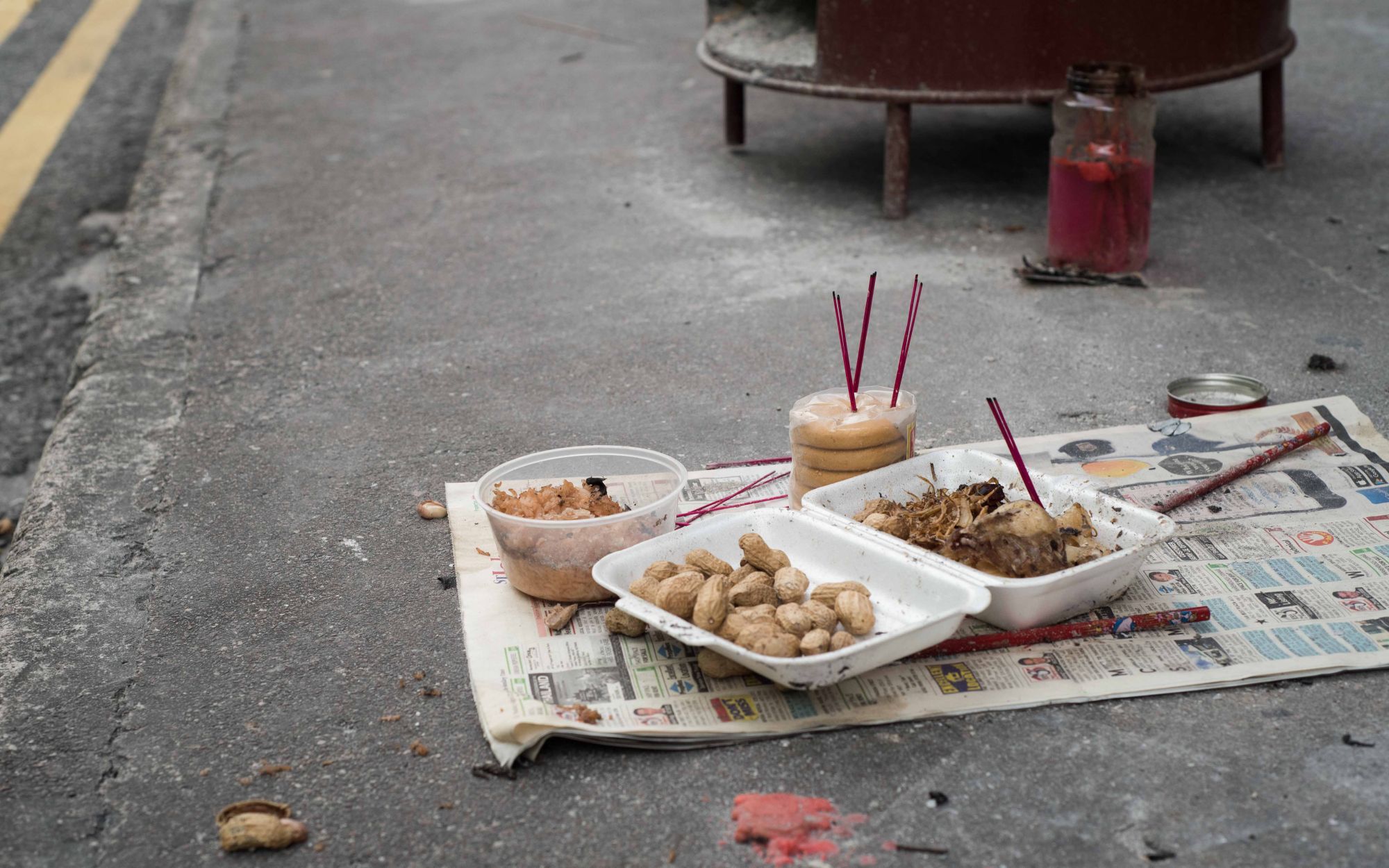 Singapore - September 5,2017 - Sacrificial offering on street on The Chinese Ghost Festival (Spirit Festival).