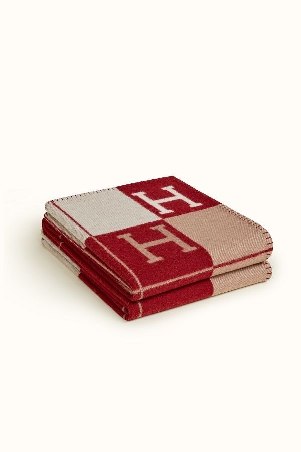 Avalon III Throw Blanket in Rouge H, from <a href="https://www.hermes.com/my/en/product/avalon-iii-throw-blanket-H102665Mv59//" target="_blank" rel="noopener">Hermes</a>