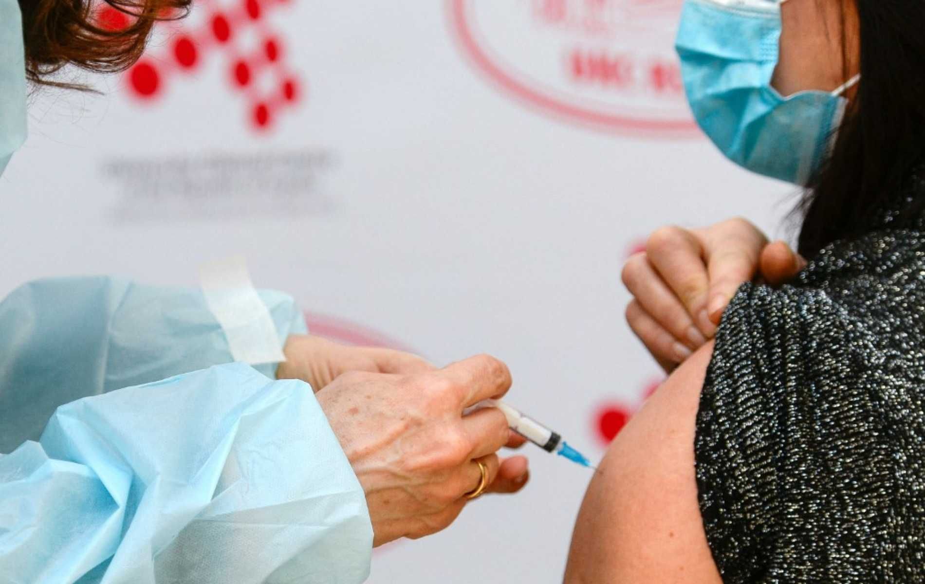 A health worker receives an injection of Russian made Covid-19 vaccine Sputnik-V at a vaccination center in Banja Luka, on February 12, 2021. - Vaccination of 1000 medical staff, involved with COVID19 patients, began on February 12, with first batch of the Russian vaccine that arrived in Bosnia and Herzegovina. Bosnia and Herzegovina's entity Republic of Srpska has acquired the first COVID19 vaccine, through direct purchase from Russia. Rest of the country still awaits previously ordered vaccines through Eu