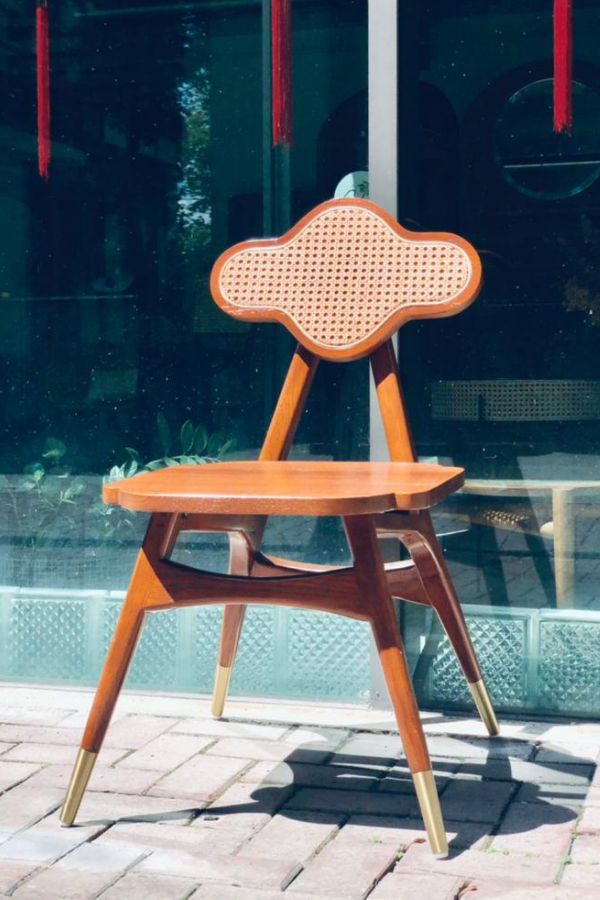 The chair back's shape was inspired by Nanyang’s fortune symbol