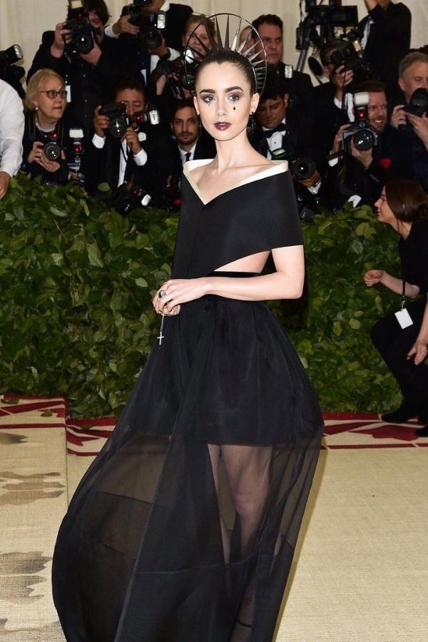 Lily Collins in Givenchy at the 2018 Met Gala. The theme was "Heavenly Bodies: Fashion and the Catholic Imagination". (Photo: Instagram/@lilyjcollins)