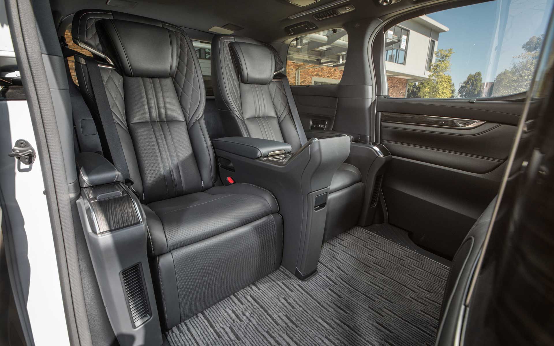 Step inside to find a pair of VIP lounge chairs seats that offers plenty of legroom to spare.