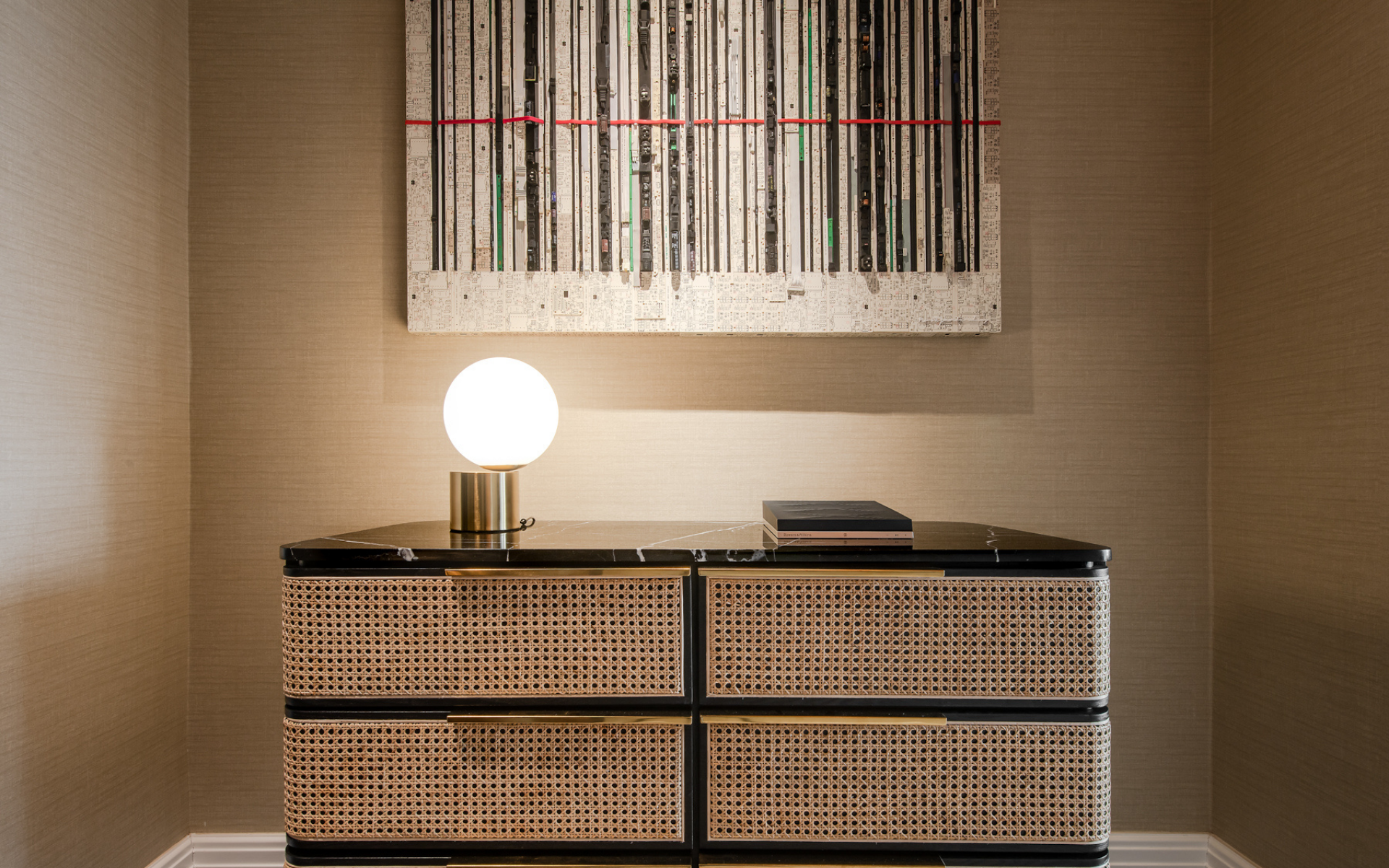 Nor Tijan Firdaus' Just Scan It is juxtaposed against a Nic Chris console wrapped with woven rattan (Photo: David Yeow Photography)