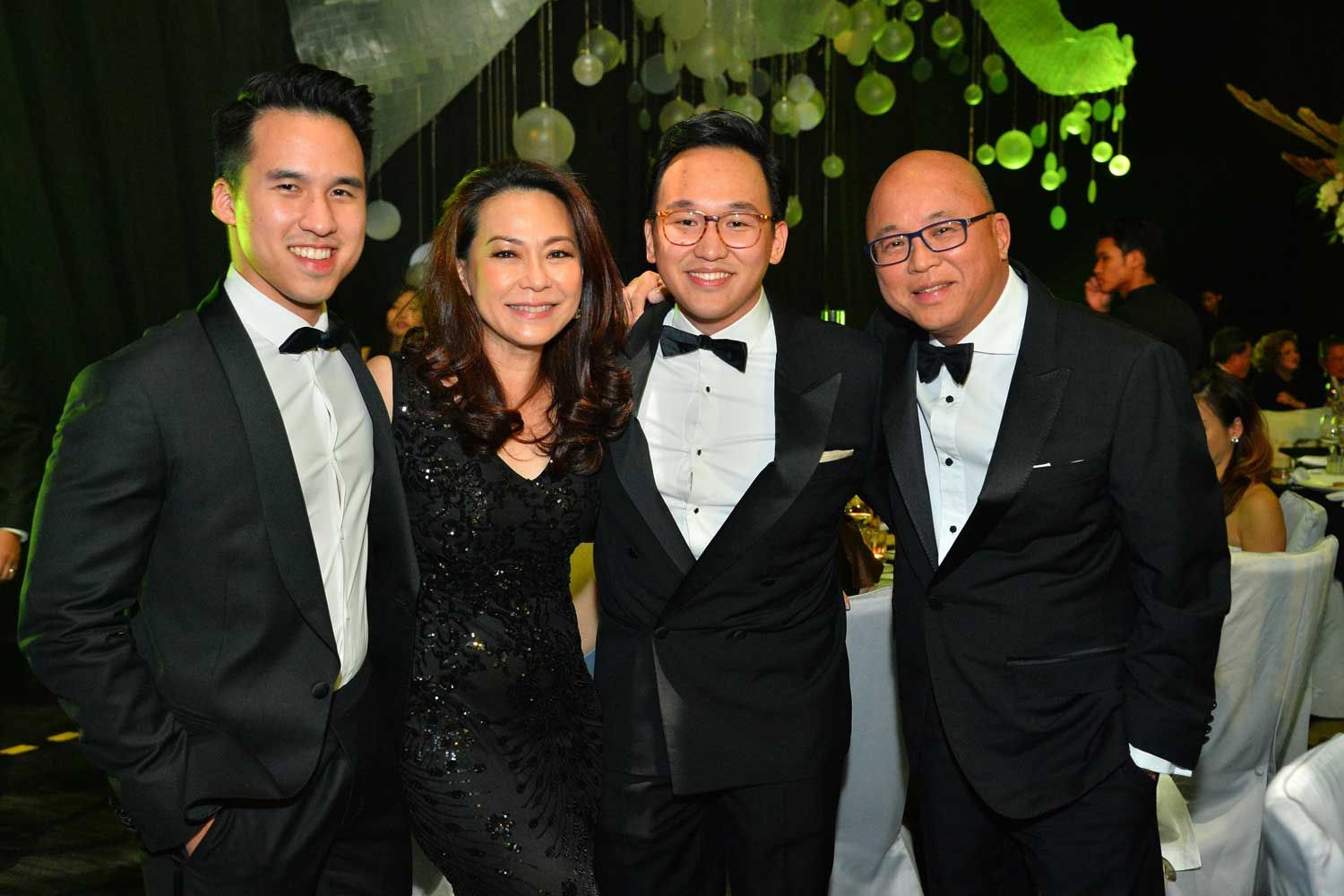 The family that dresses well together has way more fun, as Datin Patsy Loh showed us in this candid family shot at Tatler Ball 2019 (Photo: Richard Chin/Tatler Malaysia)