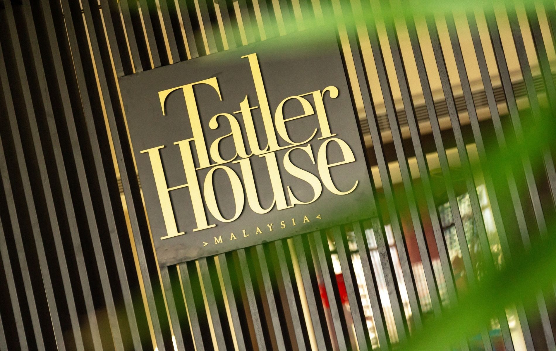 The Tatler House logo on a custom screen in the arrival hall (Photo: Khairul Imran)