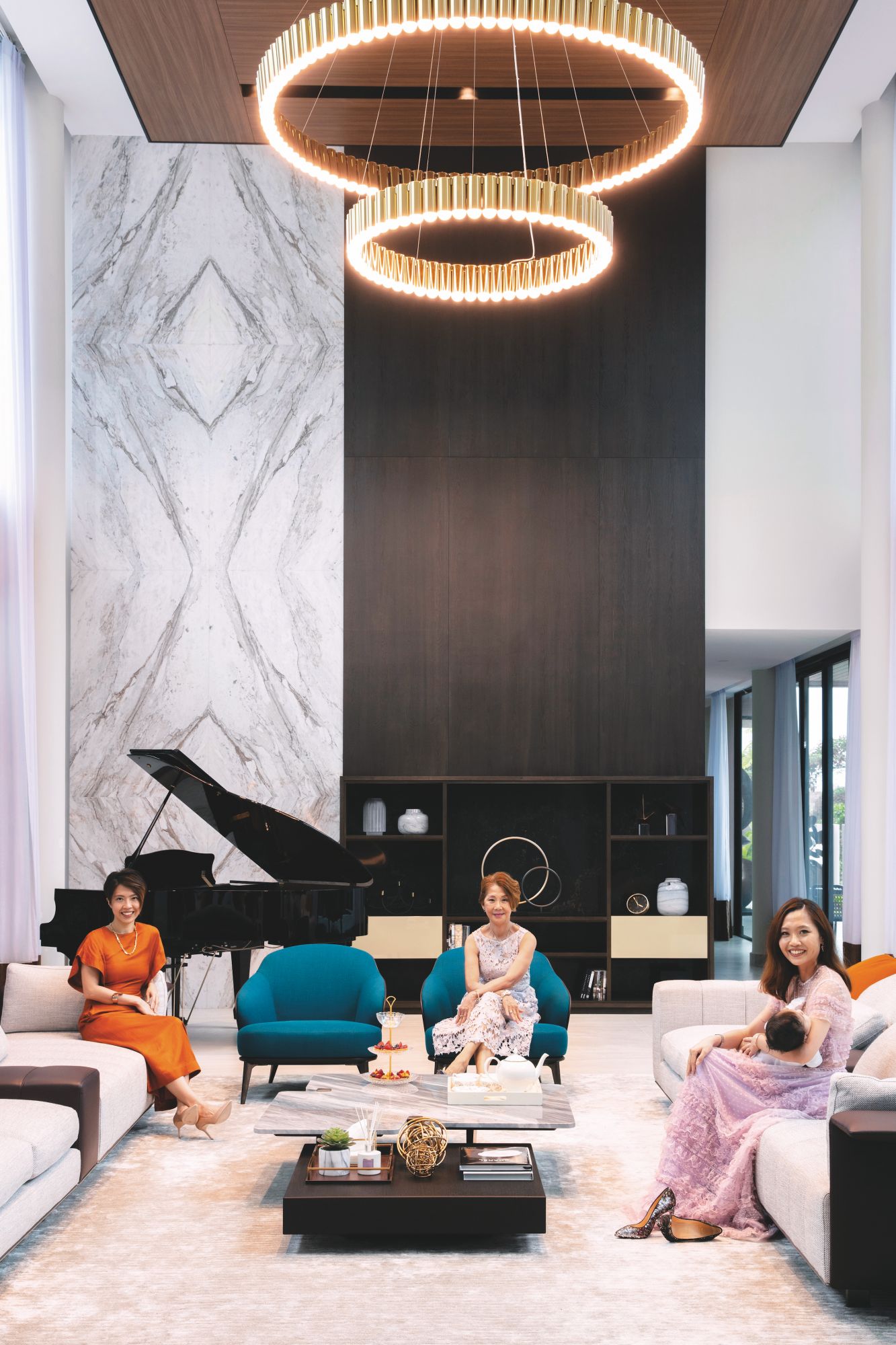 Team BJ design director, So En Lim, Datin Mary Ngooi and Karina Ng sit in the grand living room