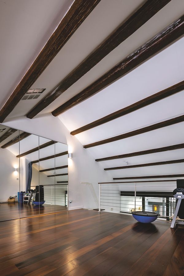 The open space in the highest level serves as a gym