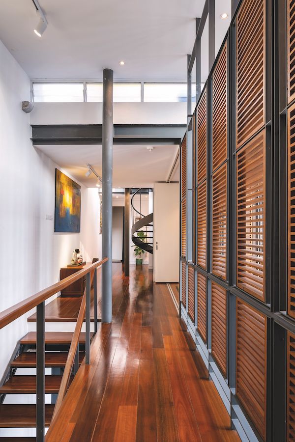 Ordered timber screens form the identity of the space