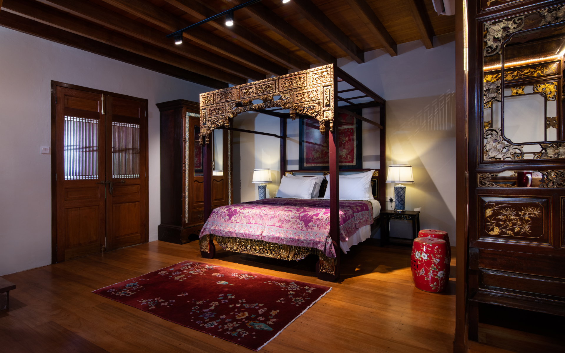 An antique wedding bed and cabinets can be found in The Stewart Apartment