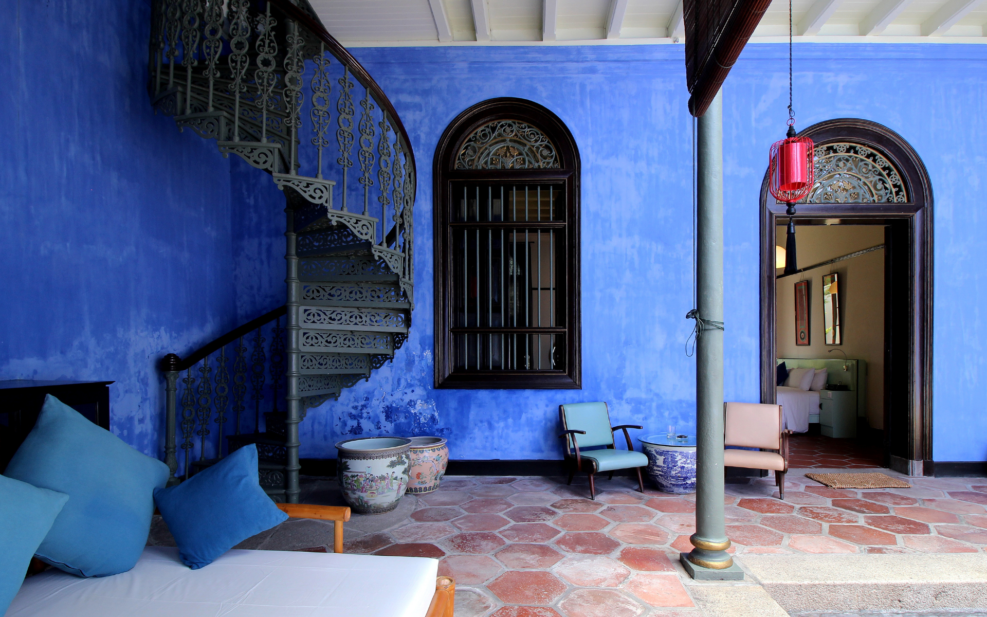 The Cheong Fatt Tze Mansion is also known as the Blue Mansion because of its distinctive indigo walls