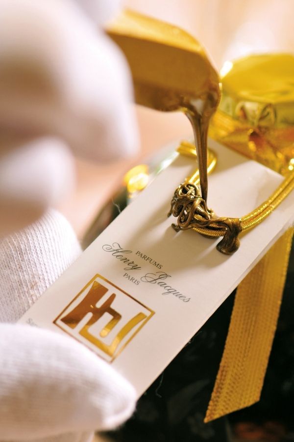Luxurious details of a Henry Jacques perfume