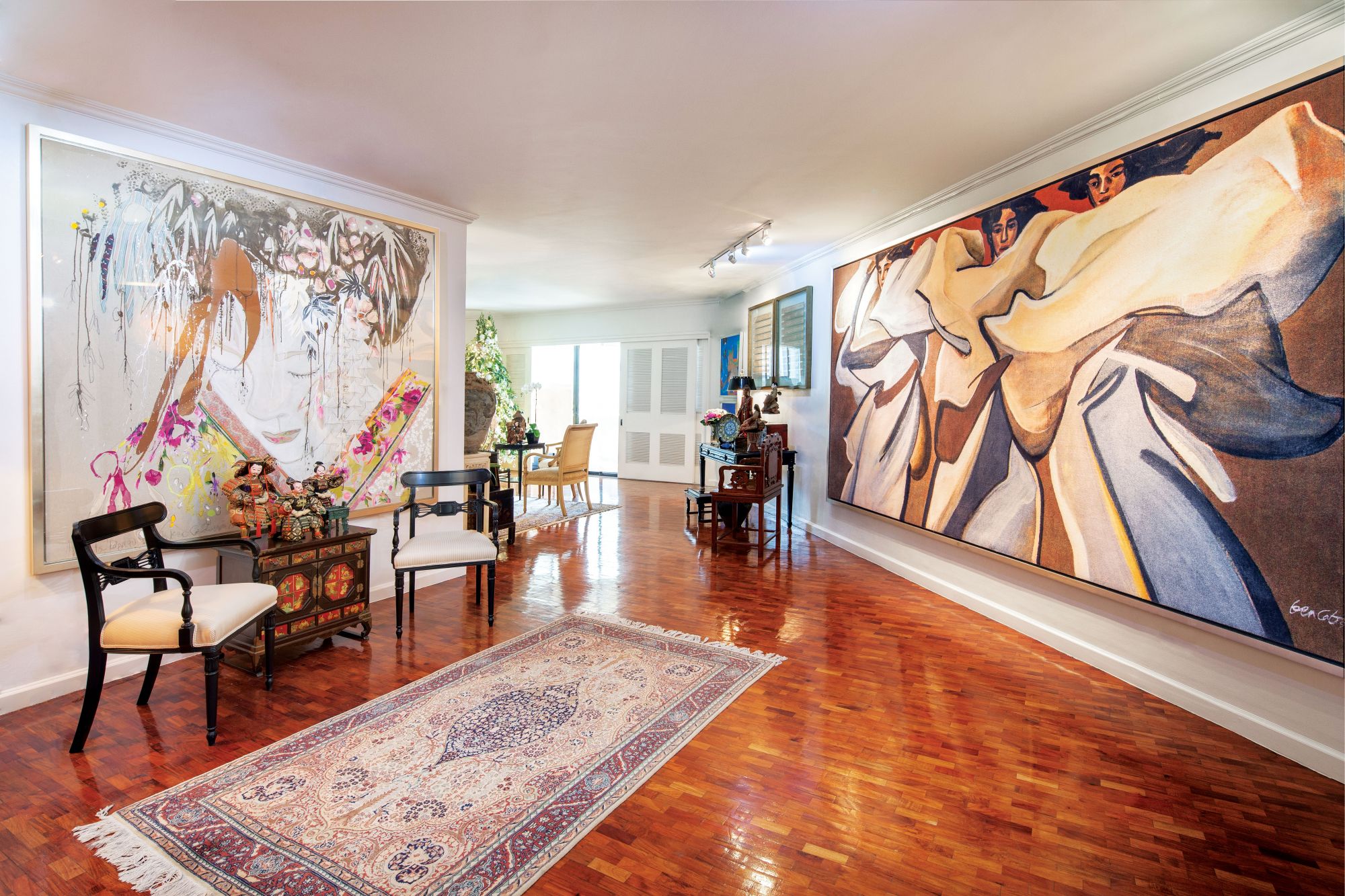 One of National Artist Benedicto Cabrera’s collaborations with Moooi faces a demure geisha by Spanish artist Teresa Calderón in the dining area of Agnes Huibonhoa’s homey office in Makati