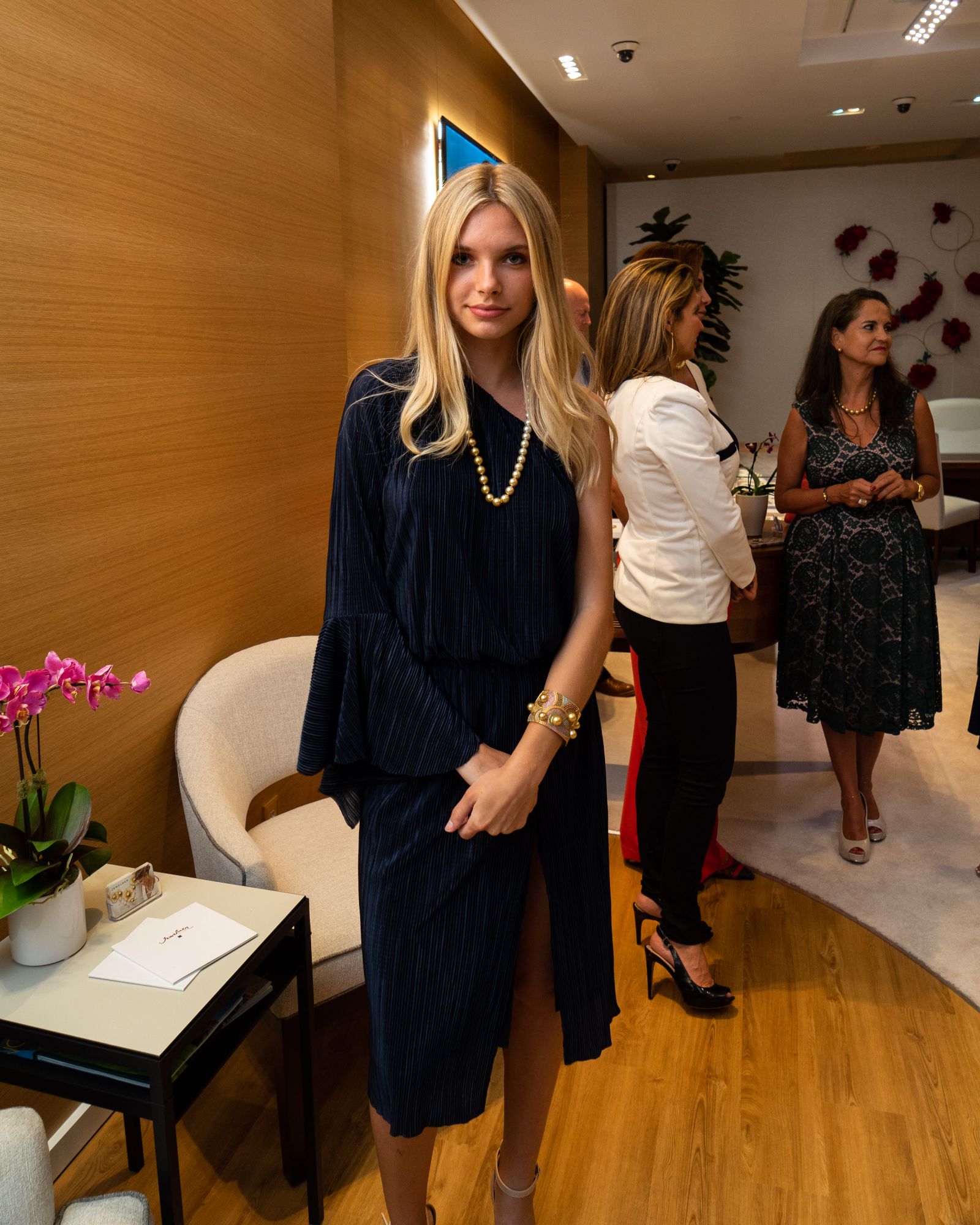 Weronika Raczkowska wearing a pearl strand and the Ce La Vie cuff by Jewelmer