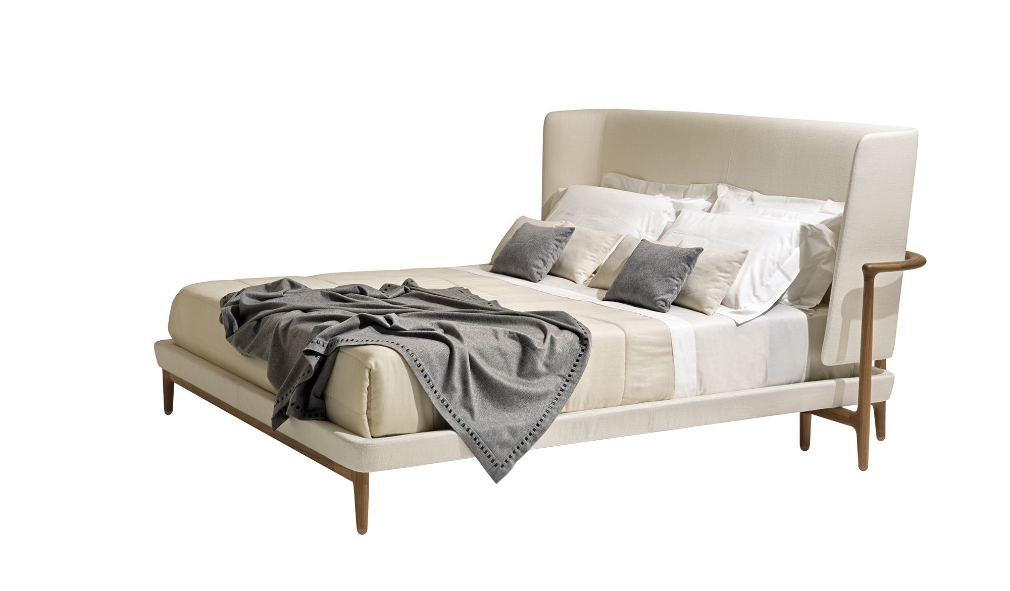 Pairing together a curved headboard and a lightweight frame, Roberto Lazzeroni's Pegaso bed offers the ultimate in comfort. Available at Furnitalia