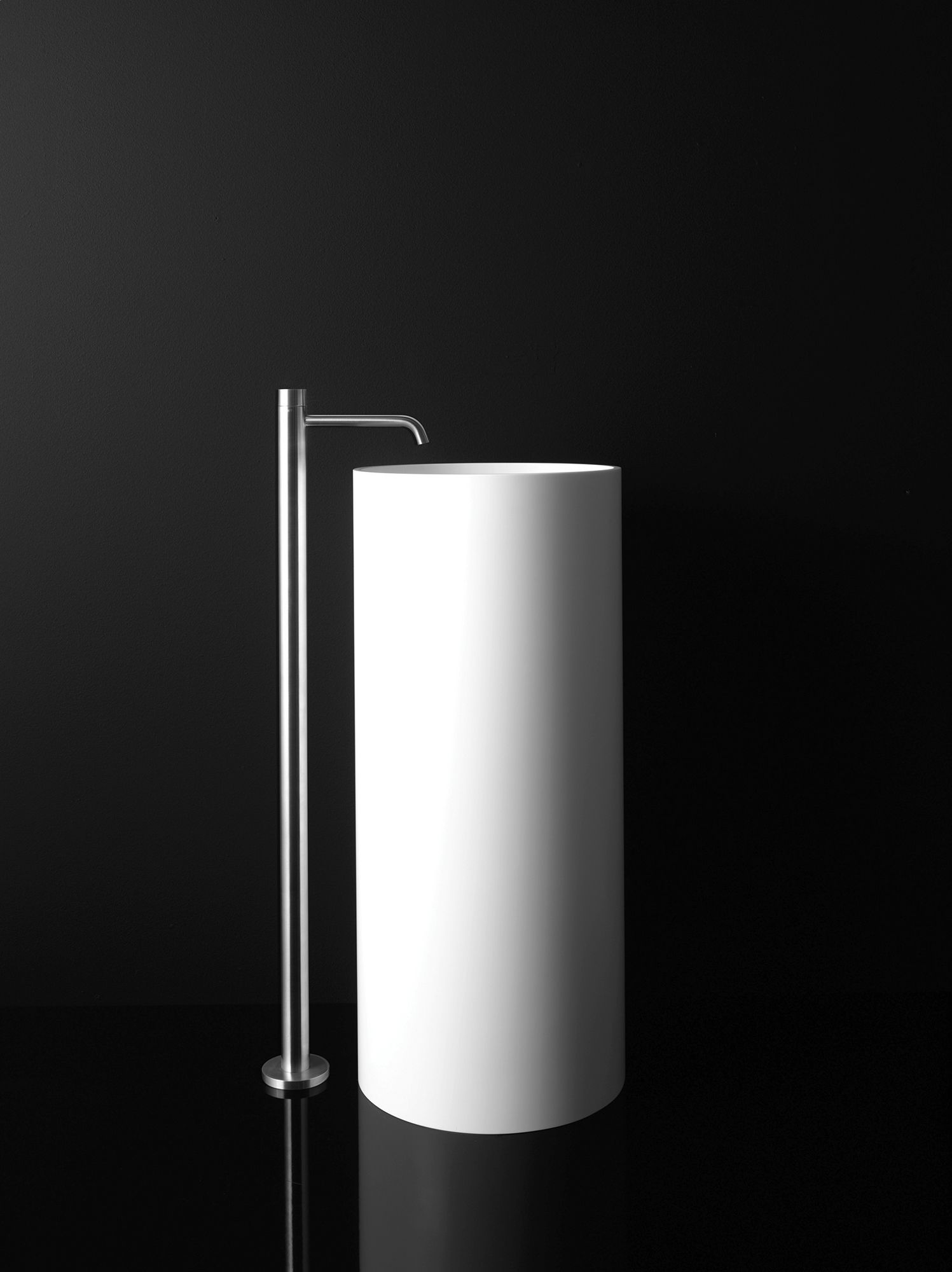 Austere in its appearance, Piero Lissoni's PH Stone freestanding washbasin is pure modern luxury in Carrara marble. Available at Focus Global Inc