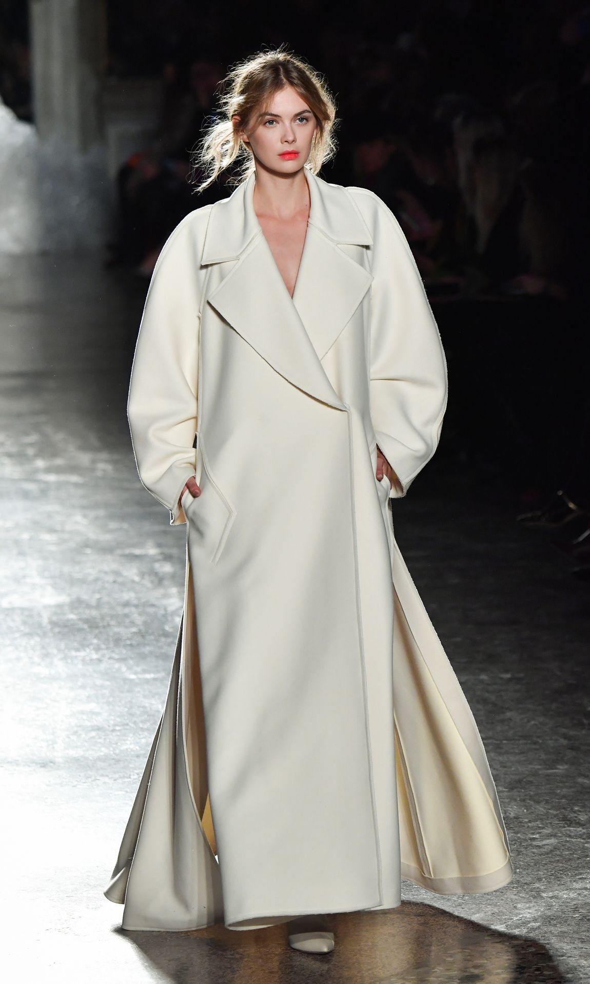 A model presents a creation during the Genny women's Fall/Winter 2019/2020 collection fashion show, on February 21, 2019 in Milan. (Photo by Andreas SOLARO / AFP)