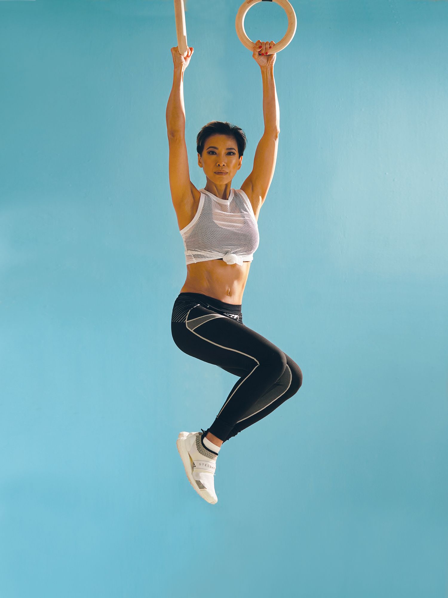 Nike top, Off-White leggings, and Stella McCartney sneakers