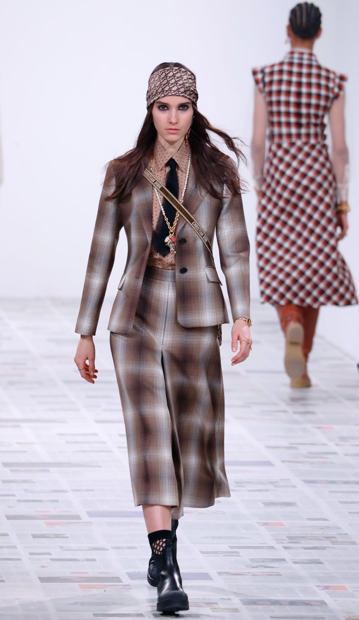 A model presents a creation by Dior during the Women's Fall-Winter 2020-2021 Ready-to-Wear collection fashion show in Paris, on February 25, 2020. (Photo by FRANCOIS GUILLOT / AFP)