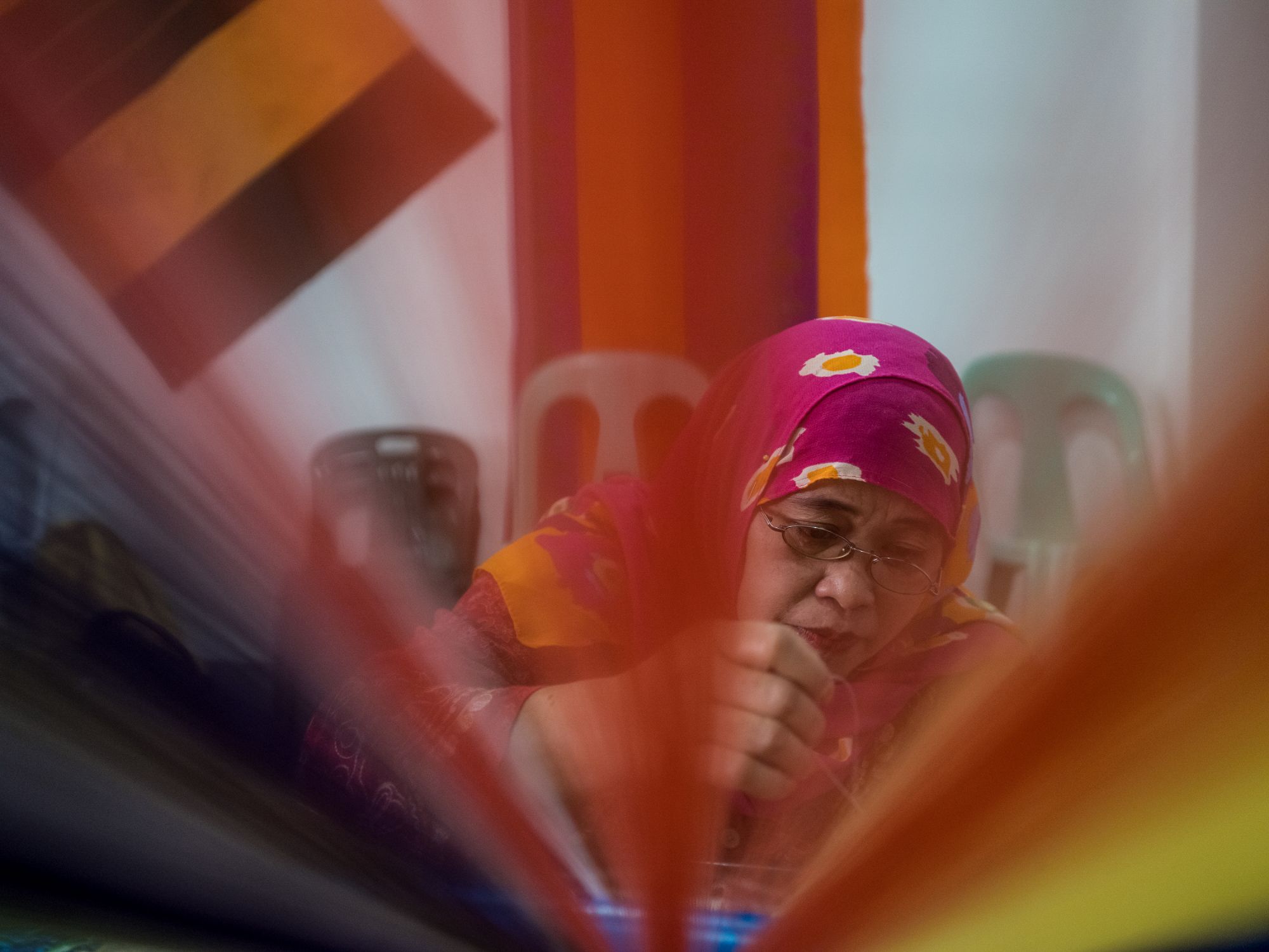 Soraida Bato weaves a new design in Marawi, Philippines on December 29, 2017. She just learned this traditional practice three months ago.The fighting in Marawi might be over, but the devastating aftermath remains. Six Muslim women try to reclaim what was left by returning to an almost forgotten tradition of weaving traditional textiles.