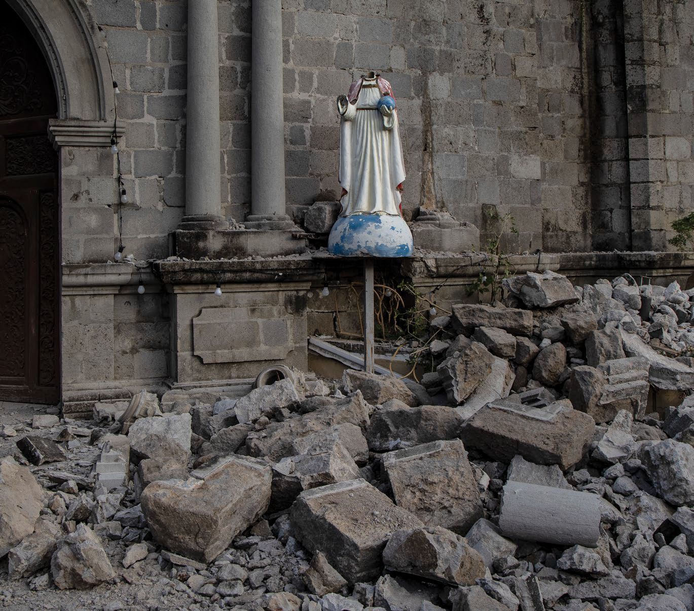 PORAC, PHILIPPINES - APRIL 23: Rubble lies about a church damaged in a 6.3 magnitude earthquake, on April 23, 2019 in Porac in Pampanga province, Philippines. A 6.3 magnitude earthquake struck central Philippines on Monday, killing at least eight people and injuring 50, after buildings collapsed at several areas in Luzon island including Metro Manila, which suffered power outages. Clark International Airport was temporarily closed after part of the ceiling of the terminal caved in. Residents in Manila descr