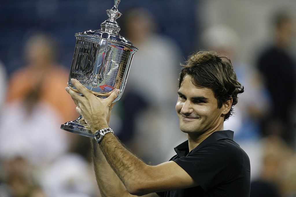 NEW YORK - SEPTEMBER 09: Roger Federer of Switzerland holds up the US Open Trophy after defeating Novak Djokovic of Serbia during day fourteen in the Men's final of the 2007 U.S. Open at the Billie Jean King National Tennis Center on September 9, 2007 in the Flushing neighborhood of the Queens borough of New York City.(Photo by Rob Tringali/Sportschrome/Getty Images)