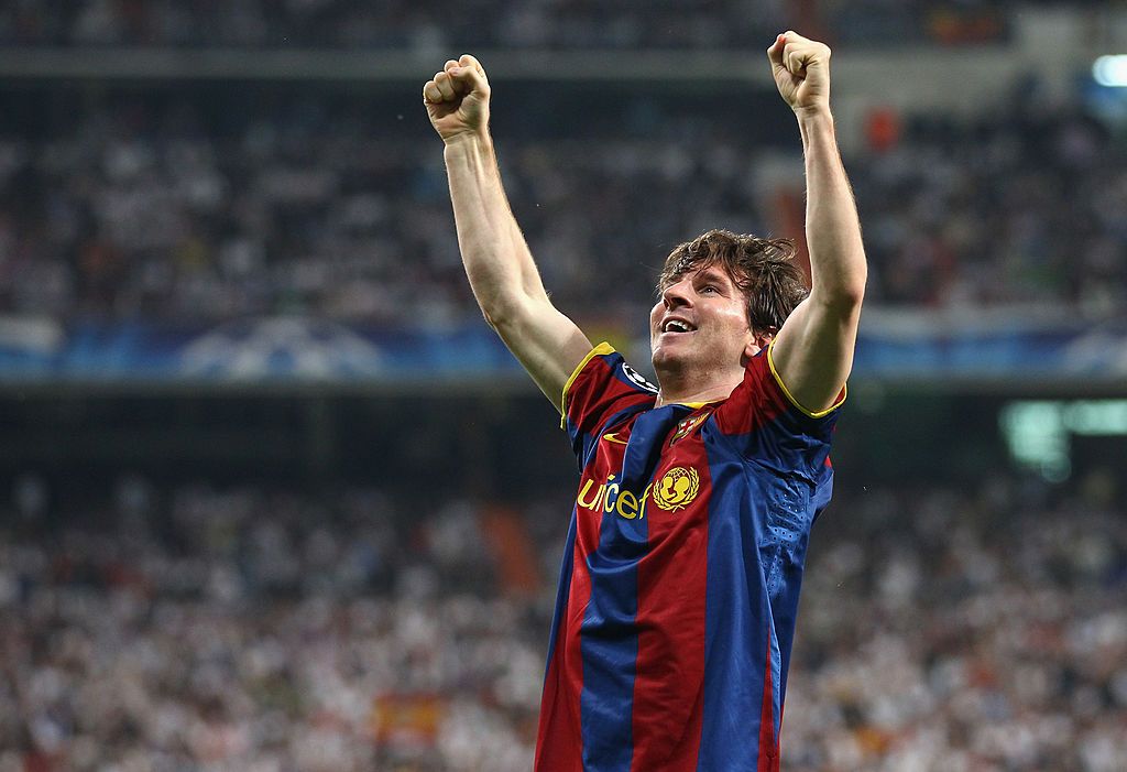 MADRID, SPAIN - APRIL 27: Lionel Messi of Barcelona celebrates after scoring his first goal during the UEFA Champions League Semi Final first leg match between Real Madrid and Barcelona at Estadio Santiago Bernabeu on April 27, 2011 in Madrid, Spain. (Photo by Alex Livesey/Getty Images)