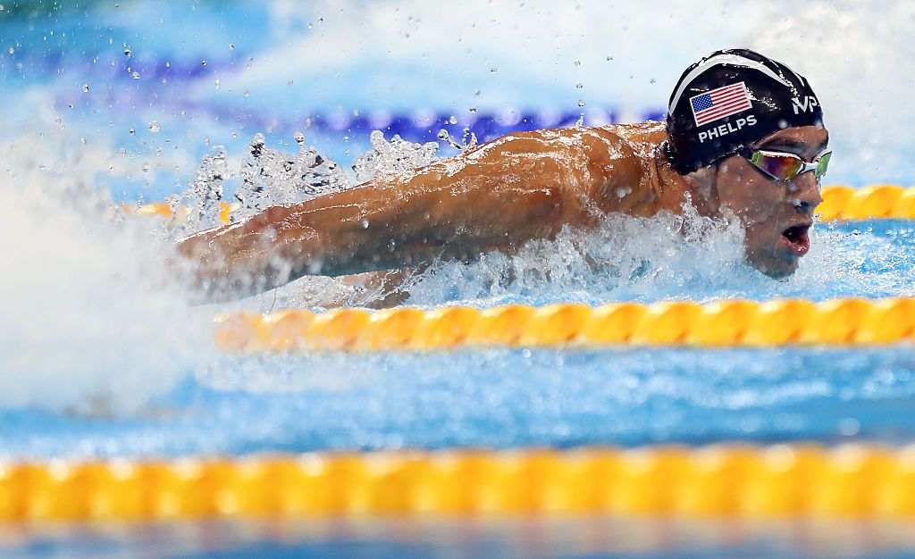 RIO DE JANEIRO, BRAZIL - AUGUST 13: Michael Phelps of the United States competes in the Men's 4 x 100m Medley Relay Final on Day 8 of the Rio 2016 Olympic Games at the Olympic Aquatics Stadium on August 13, 2016 in Rio de Janeiro, Brazil. (Photo by Amin Mohammad Jamali/Getty Images)