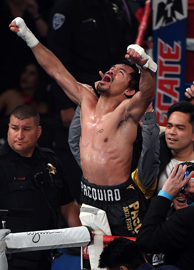 LAS VEGAS, NV - NOVEMBER 05: Manny Pacquiao celebrates his unanimous-decision victory over Jessie Vargas to win the WBO welterweight championship title at the Thomas & Mack Center on November 5, 2016 in Las Vegas, Nevada. (Photo by Ethan Miller/Getty Images)