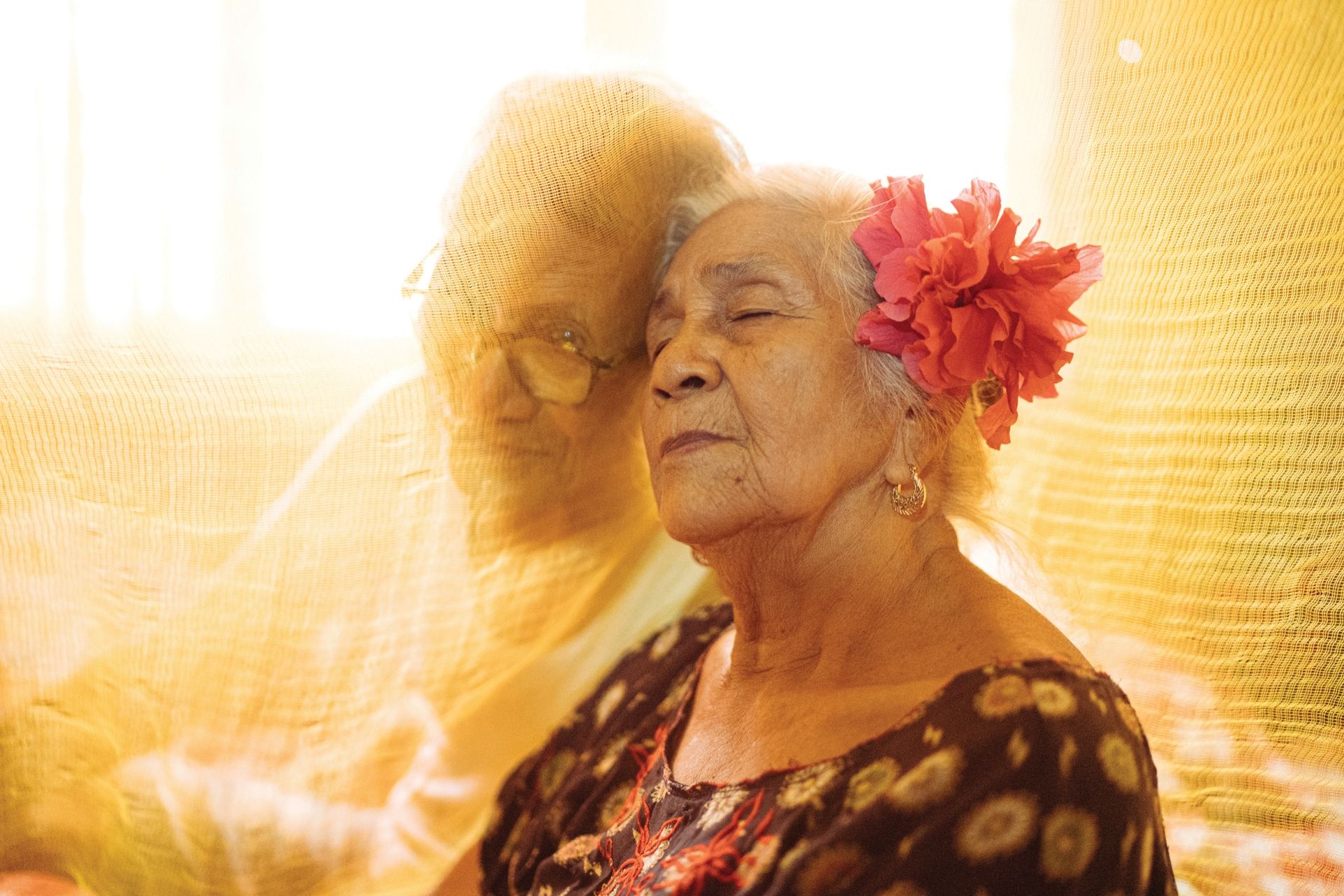 Marta poses for a photograph with her husband Apolinar in their home in Pampanga, Philippines. Martha is part of the group called âMalaya Lolas,â or âFree Grandmothers,â a group of survivors of mass rape during the second world war. Marta describes her husband's support as instrumental to her healing.