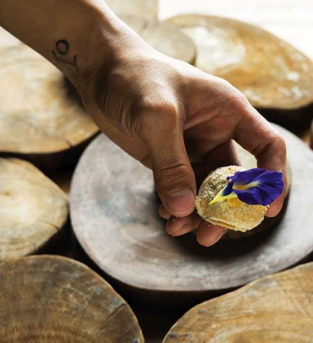 From the tasting menu is the Nilupak na Cassava with local sea urchin and blue pea on top