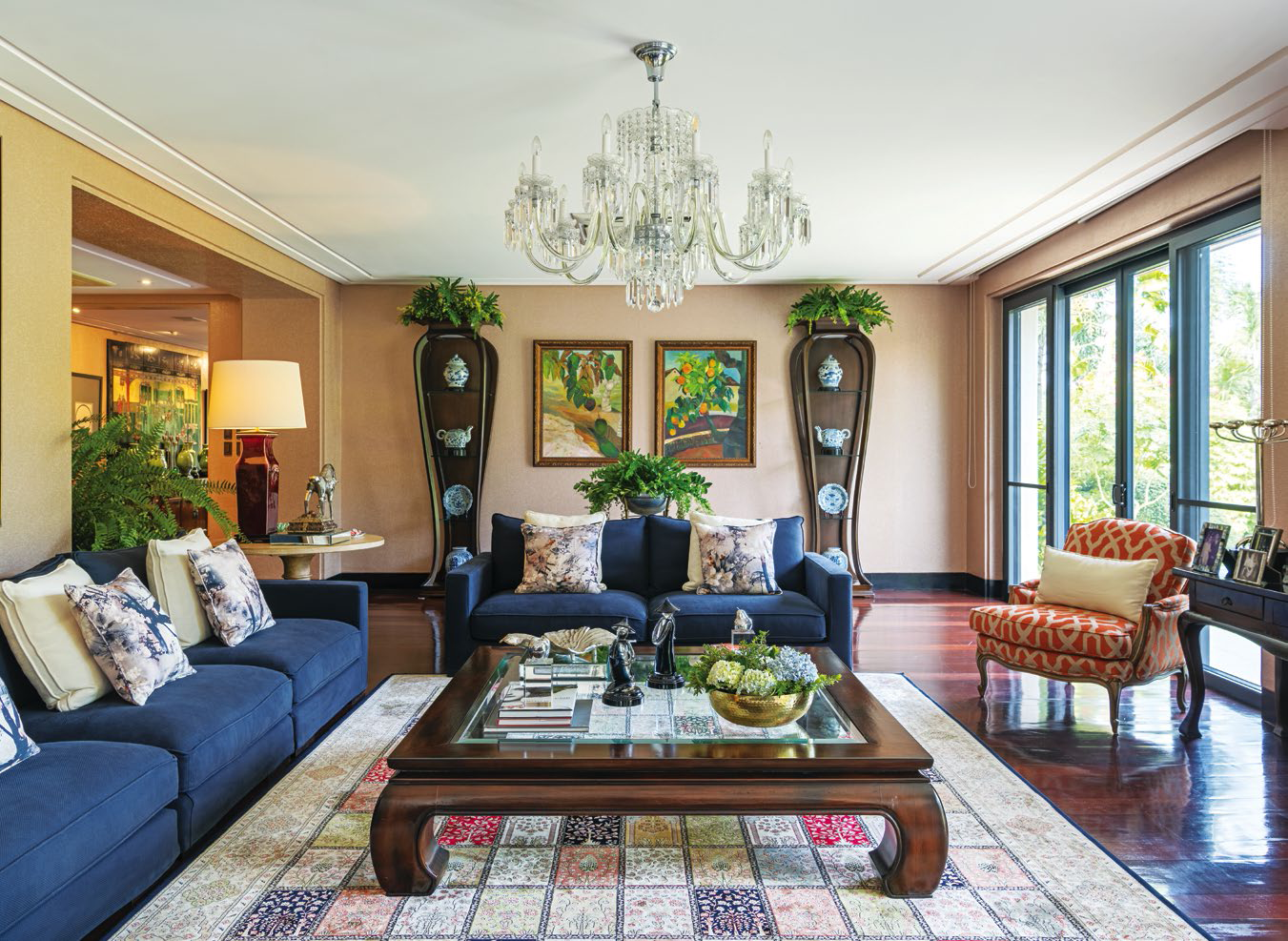 Different pieces of furniture and decor that Crickette has acquired over the years lend a personal and homey touch to the relaxed but chic living room