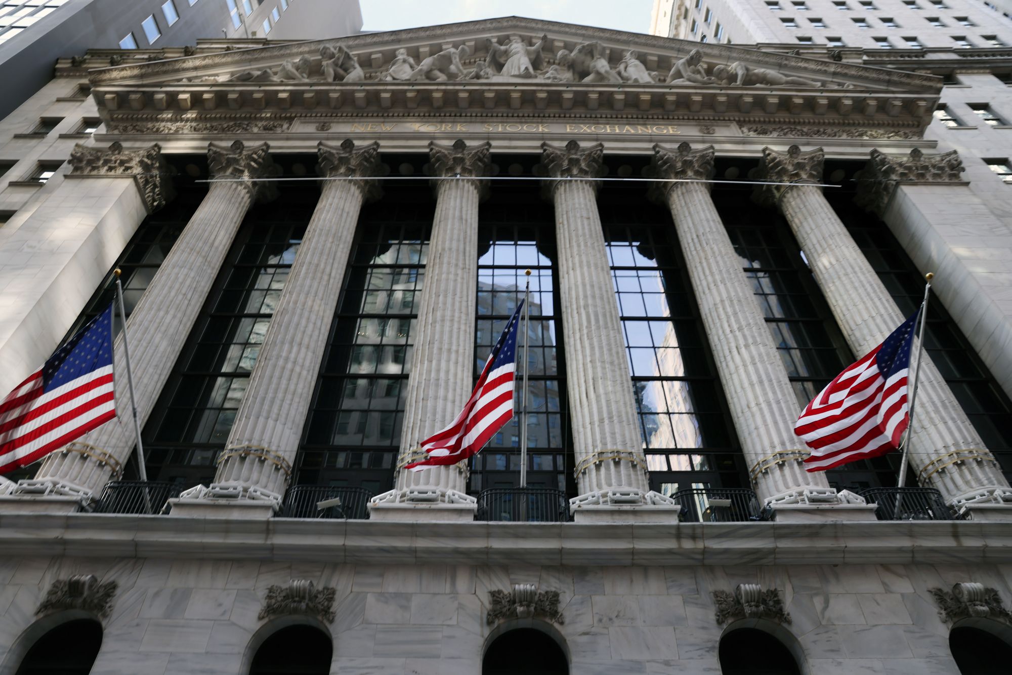 NEW YORK, NEW YORK - JANUARY 28: The New York Stock Exchange (NYSE) stands in the Financial District in Manhattan on January 28, 2021 in New York City. Markets continue a volatile streak with the Dow Jones Industrial Average rising over 500 points in morning trading following yesterdays losses. Shares of the video game retailer GameStop plunged. (Photo by Spencer Platt/Getty Images)