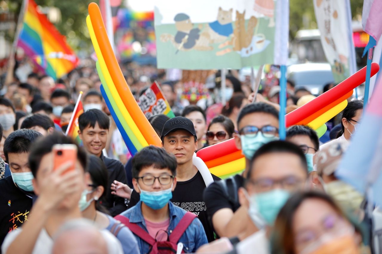 Tens of thousands of people holding rainbow flags, love sings and banners and wearing customs participate in the LGBT PARADE 2020, in Taipei City, Taiwan, on 31 October 2020. According to the organiser Taiwan Rainbow Civil Action Association, approximately 130,000 people have been involved in the annual event supporting sexual minorities' rights subsequent to the legalisation of same-sex marriage in the island back in 2019.  (Photo by Ceng Shou Yi/NurPhoto via Getty Images)