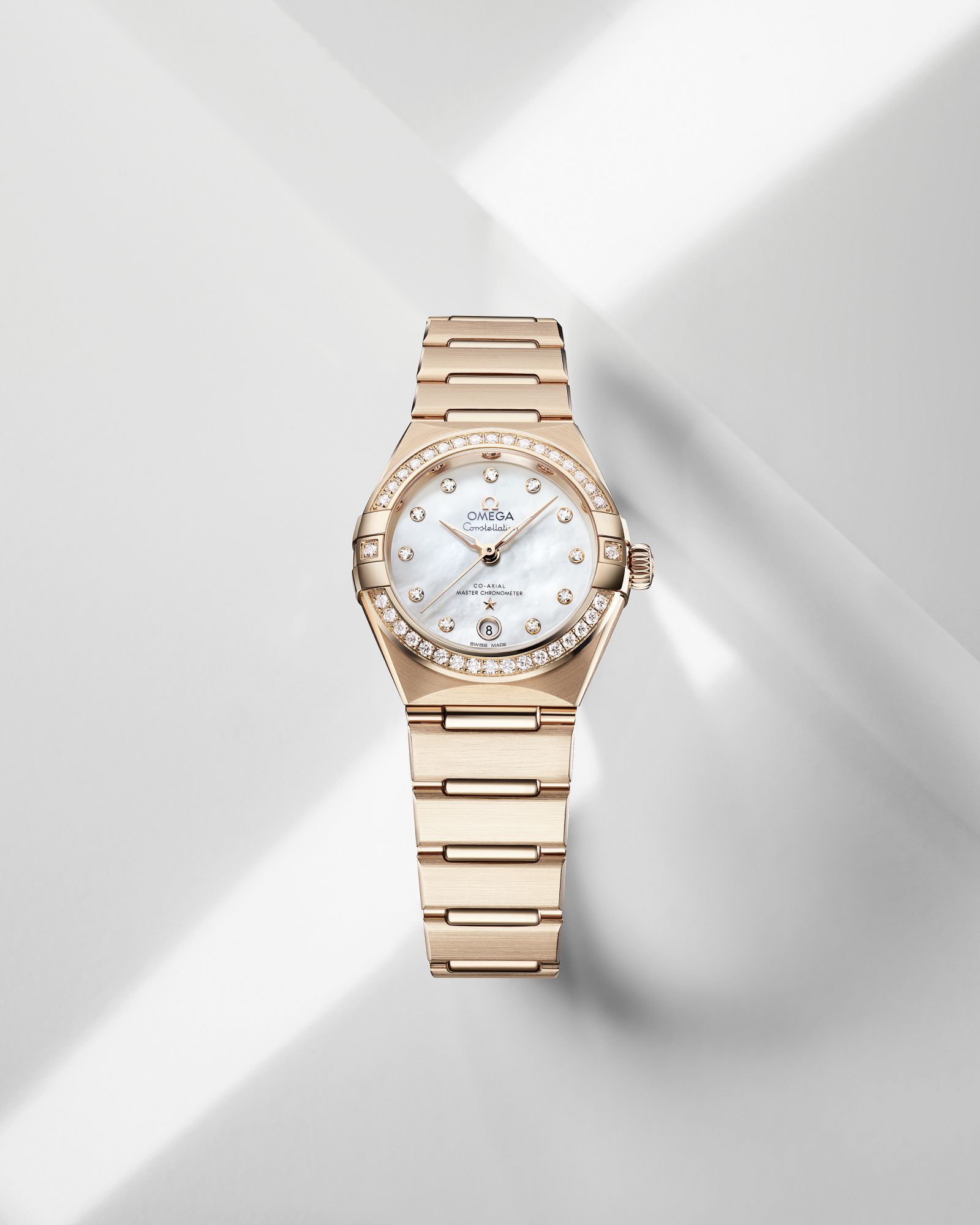 Omega Constellation in yellow gold.