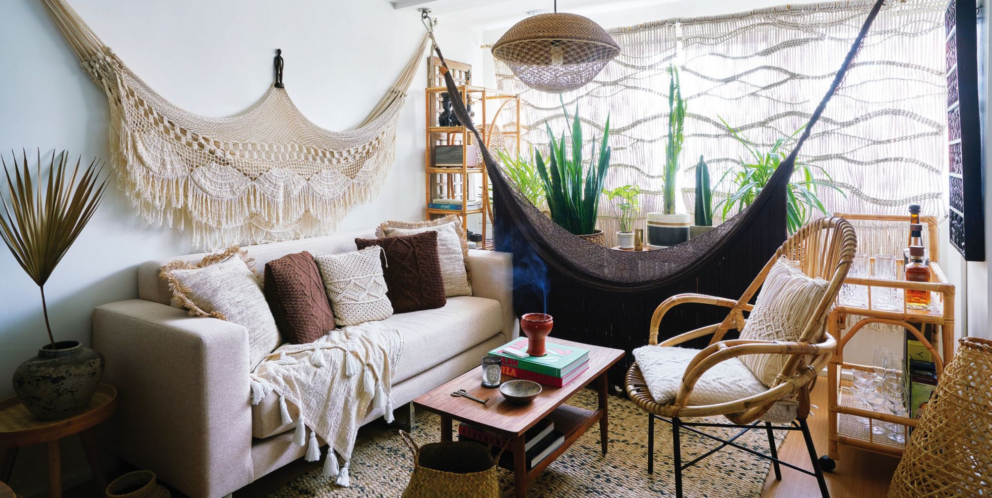 The apartment echoes a bohemian vibe with pieces from the owner’s trips abroad such as hammocks from Tulum, Mexico, as well as from local stores like the rattan accent chair from Silya Tropika and rattan bar cart and shelves from Acasa Manila