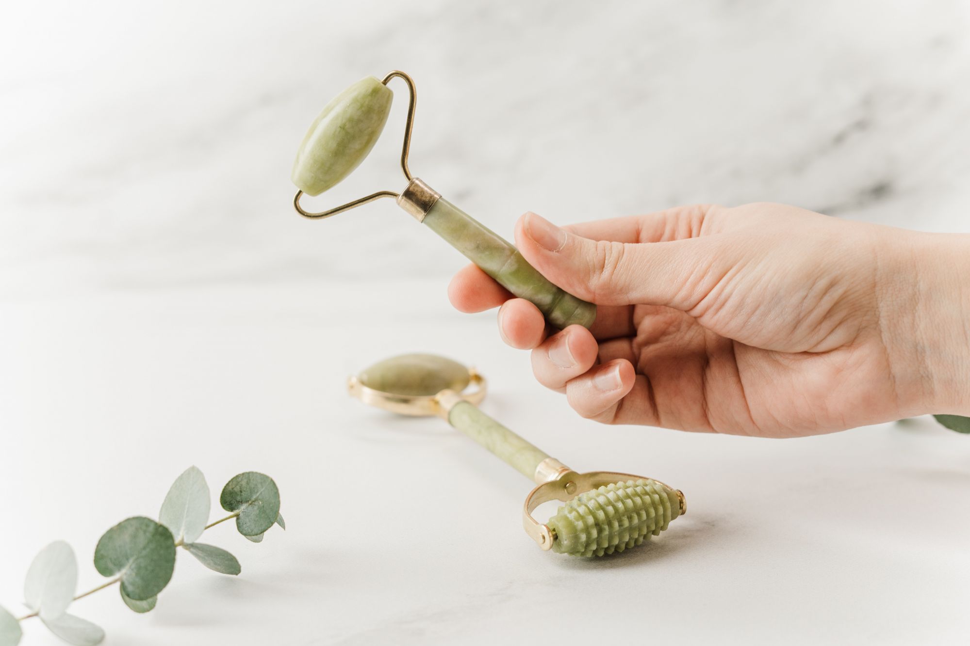 Face massage tools and rollers. | Photo by cottonbro from Pexels