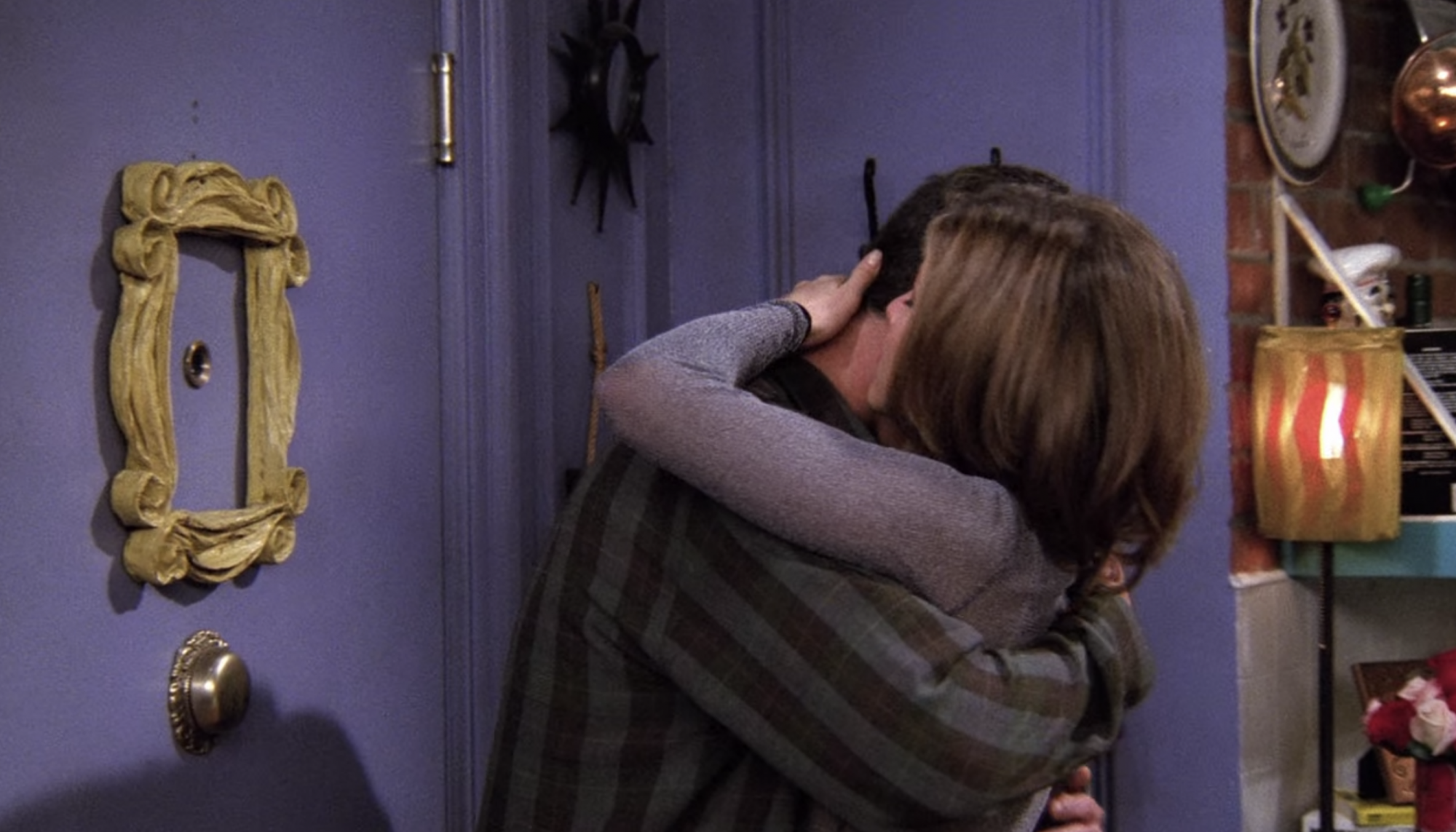 The one where Rachel kisses Ross after watching the prom video. | Photo: Netflix