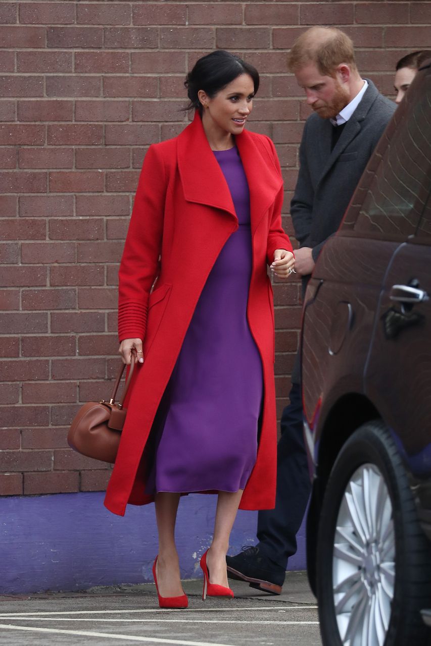 BIRKENHEAD, ENGLAND - JANUARY 14: Prince Harry, Duke of Sussex and Meghan, Duchess of Sussex visit 'Tomorrow's Women Wirral' Charity on January 14, 2019 in Birkenhead, United Kingdom. (Photo by Neil Mockford/GC Images)