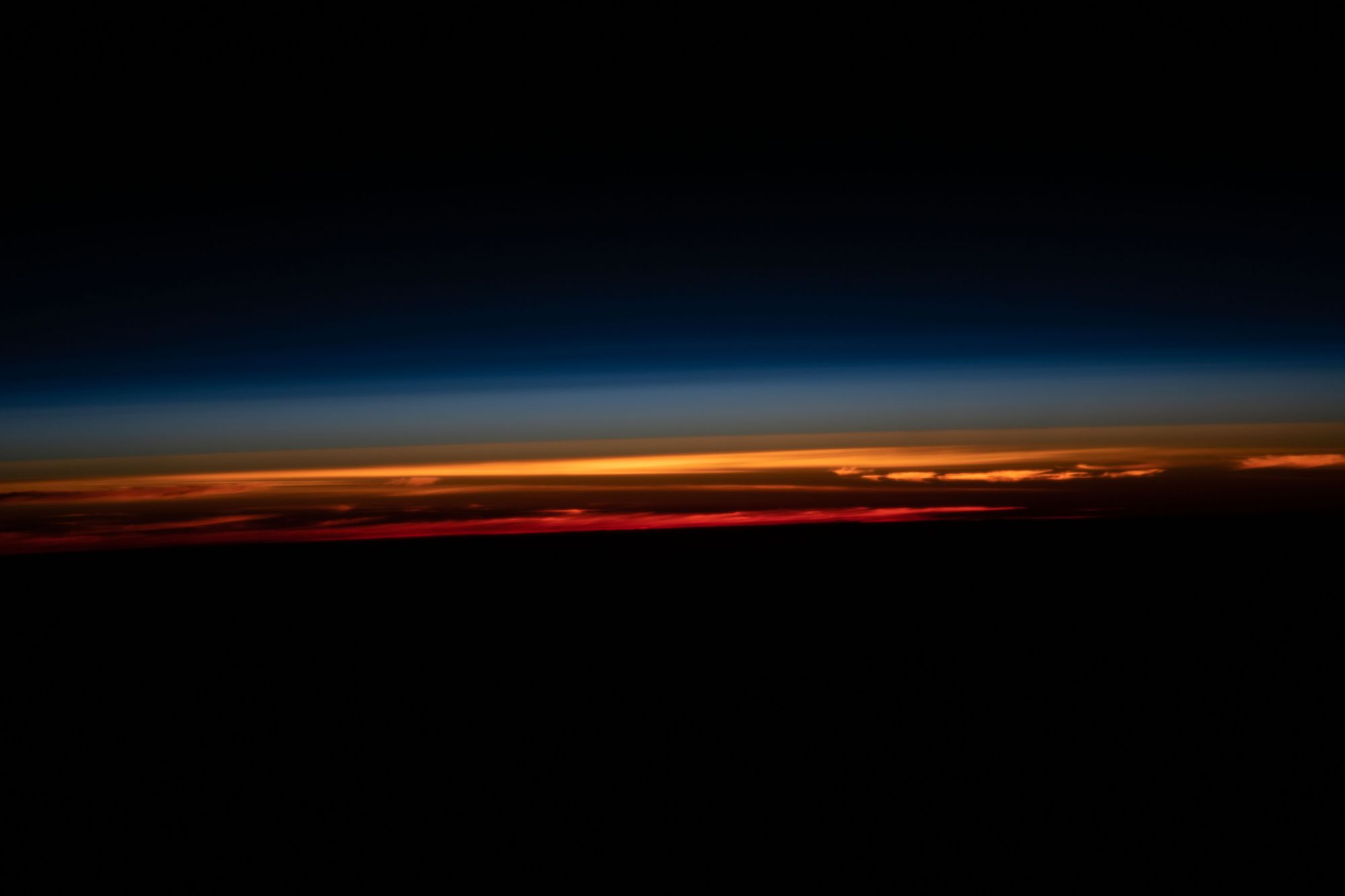This photo was taken during sunset from the International Space Station located above the earth's horizon. | Photo: NASA
