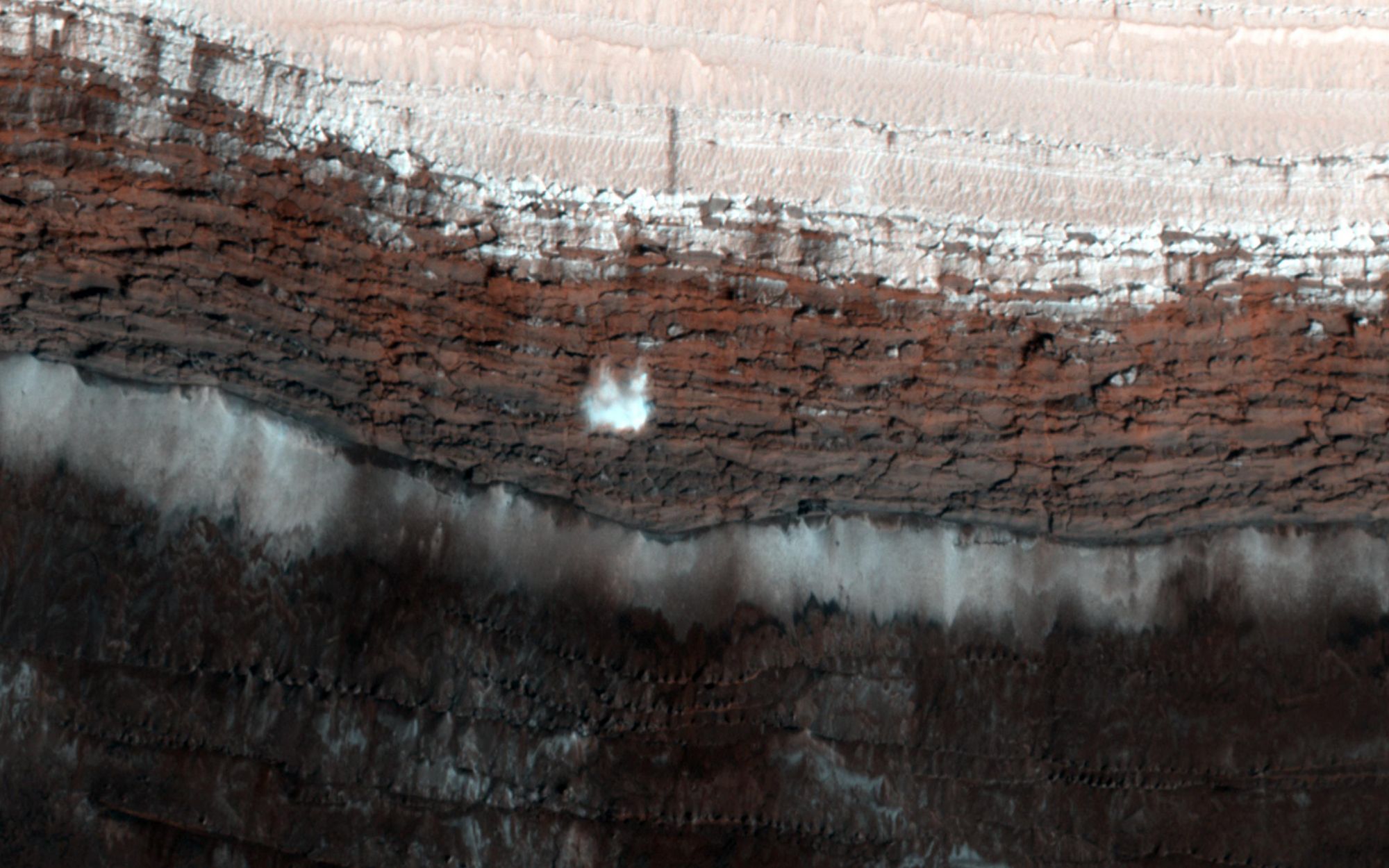 Through the HiRise, we get to see the frost avalanches happening at the edge of  the North Polar layered deposits of Mars. | Photo: NASA