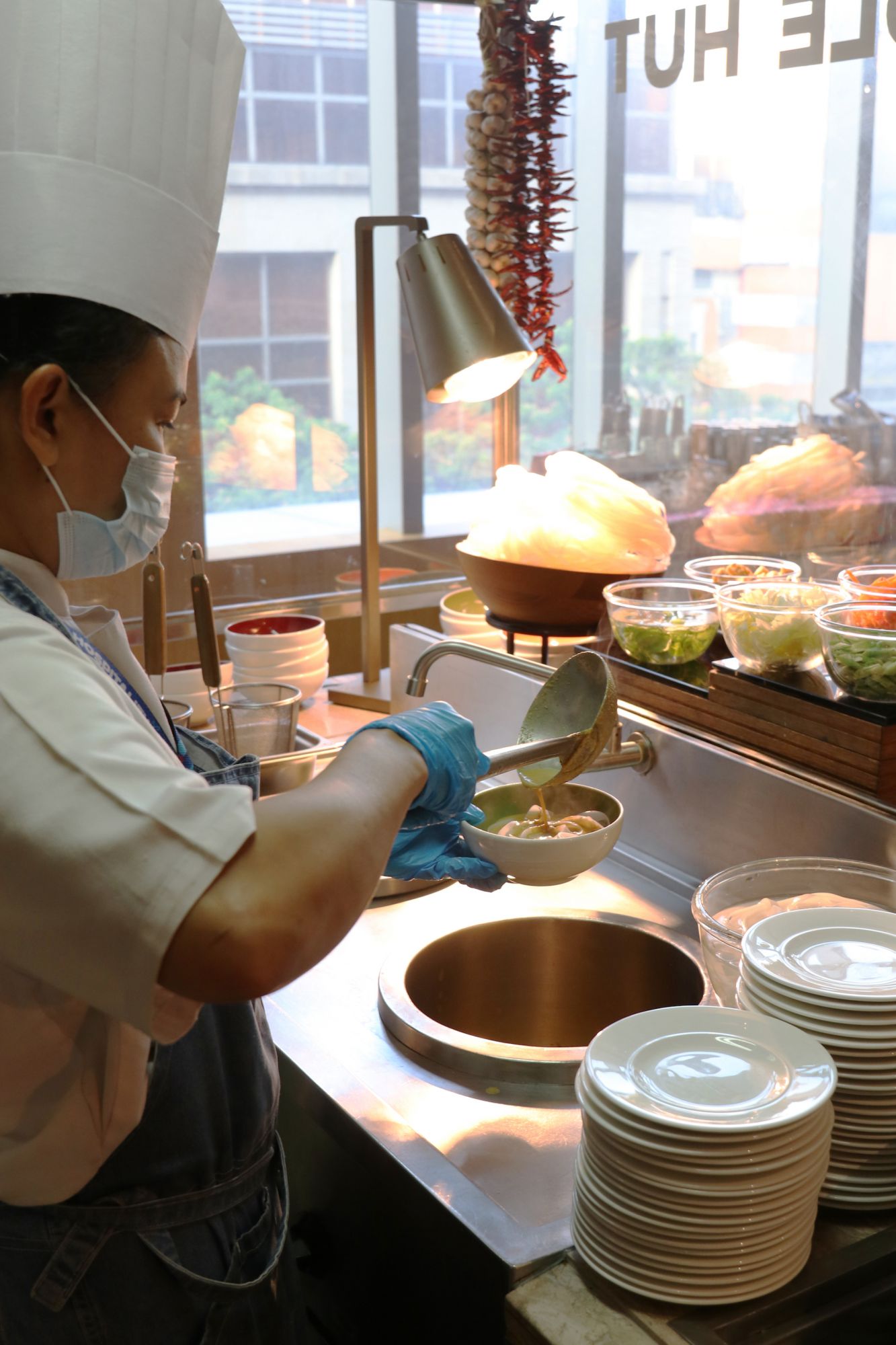 At the noodles station, diners may indulge in pork and Chinese items on offer, mouth-watering laksa, or beef pho