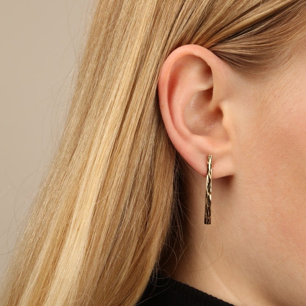 New 9ct Yellow Gold Textured Finish Long Bar Drop Earrings. | Photo: william-may.co.uk